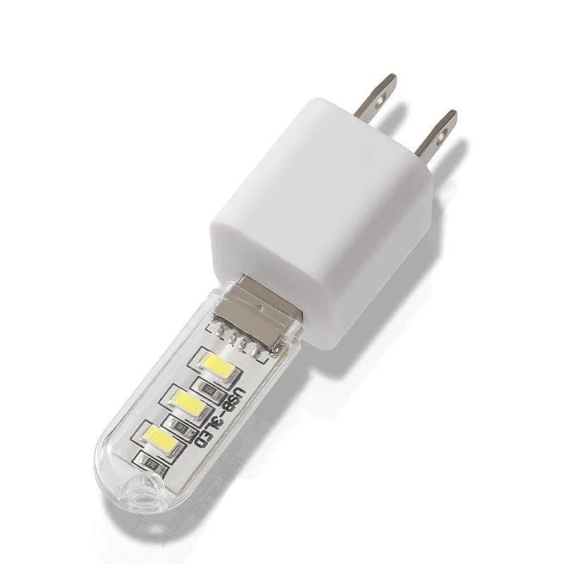 Small white USB LED night light with warm and white light settings.