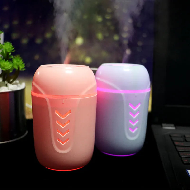 Portable car humidifier with columnar design in blue, pink, and white colour options