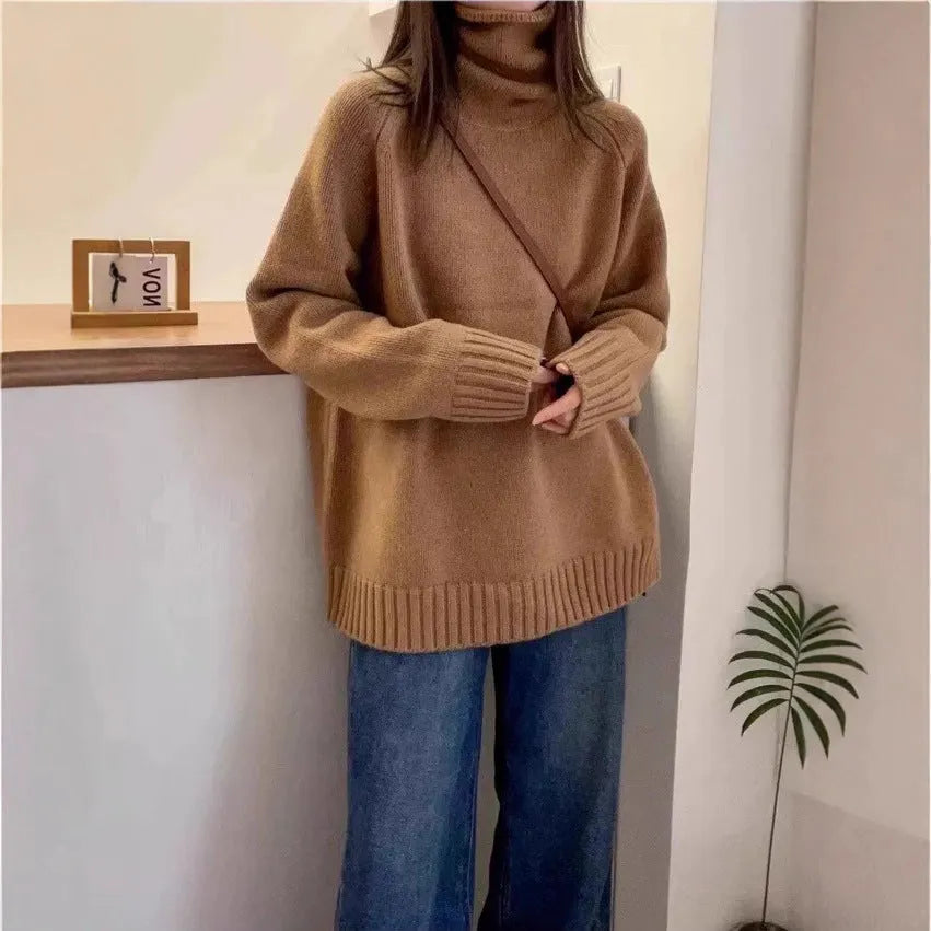 Women's loose fit thick turtleneck sweater with a 3D curling pile collar in red.