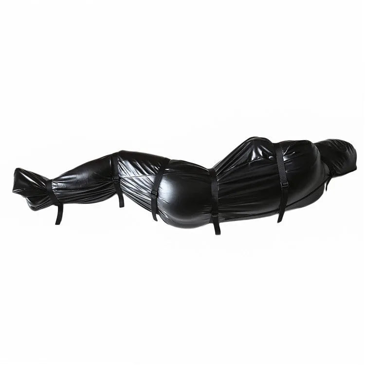 Black patent leather bondage set showing full body wrap and six ratchet tie-down straps arranged together