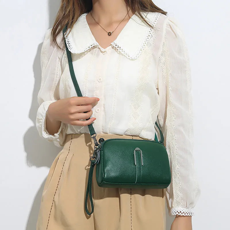 Genuine leather women's shoulder bag in a horizontal square shape, shown in black colour.