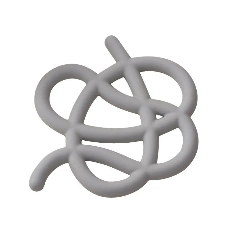 Ceramic heat proof placemat in irregular shape on a dining table