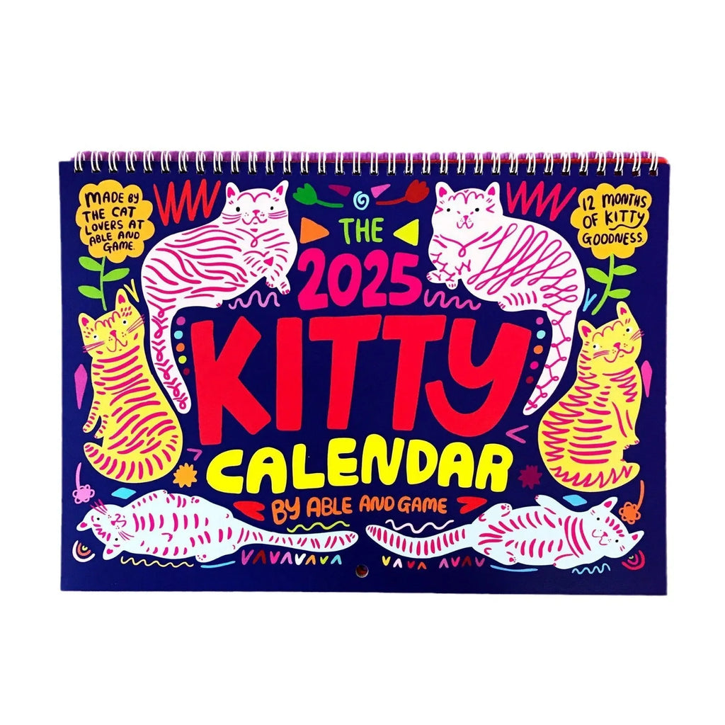 A4 cat wall calendar showing a monthly page with a cat photograph and date grid