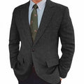 Men's brown herringbone suit jacket with long sleeves and retro business casual style.