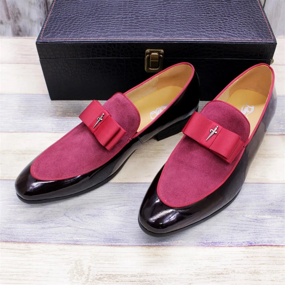 Men's low-top leather shoes in black with patent leather finish and a tassel detail.