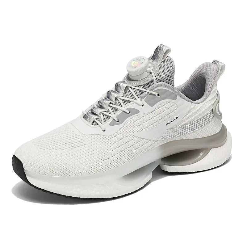 Men's low-top running shoes in beige with a rotating buckle and mesh upper, shown on a white background.