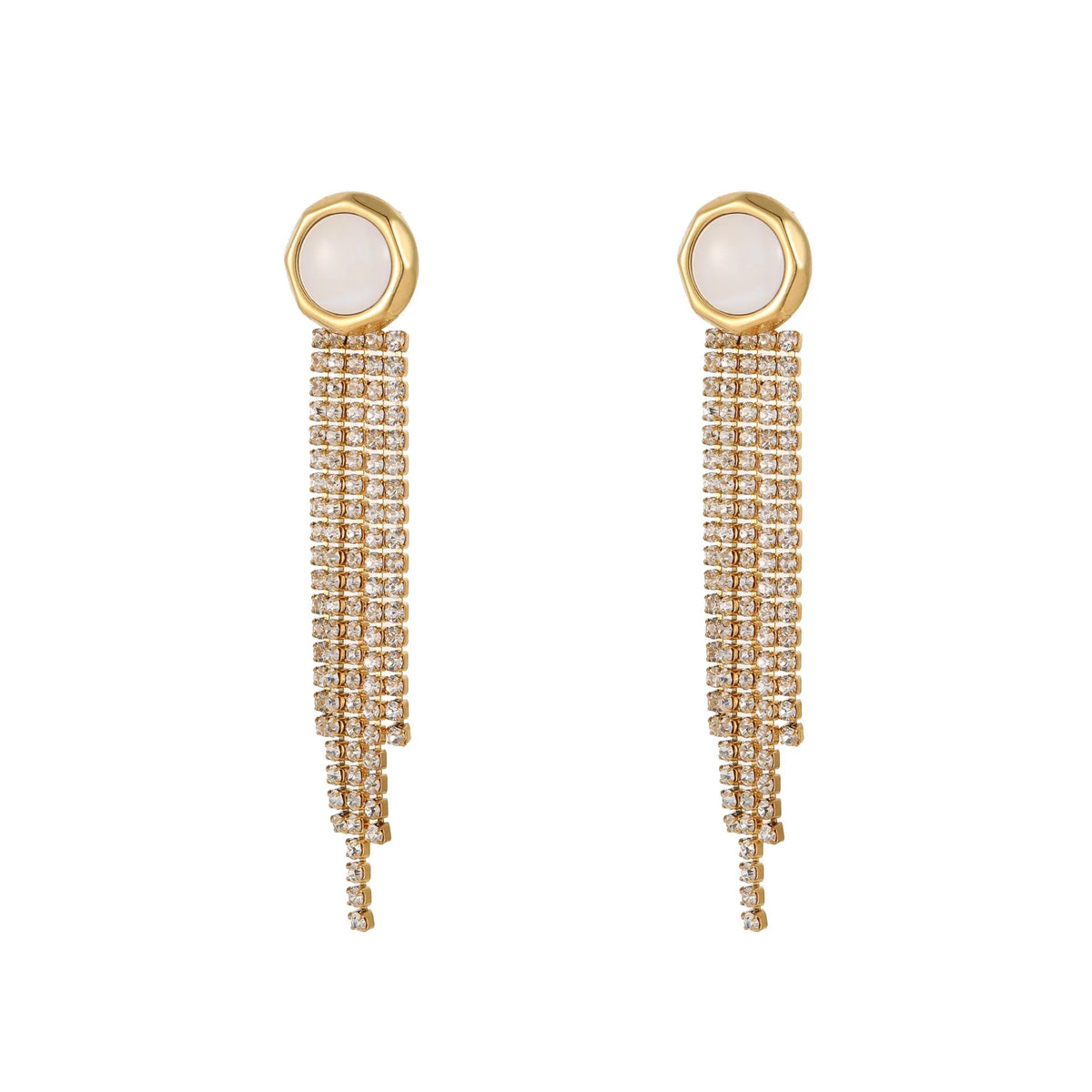 Women's gold heart and star shaped earrings with a diamond tassel detail on a white background.
