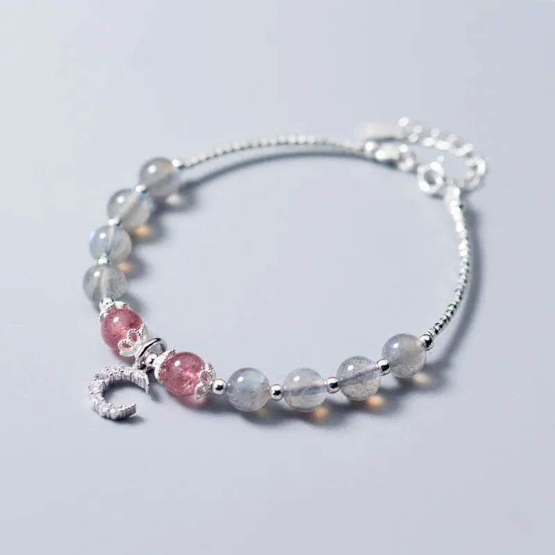 Handmade adjustable silver tone bracelet with natural moonstone crystal and small crescent moon charm