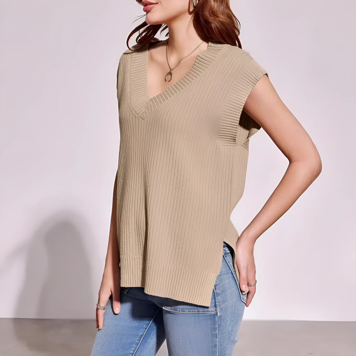 Camel coloured v-neck sleeveless loose pullover vest with striped pattern and folding detailing