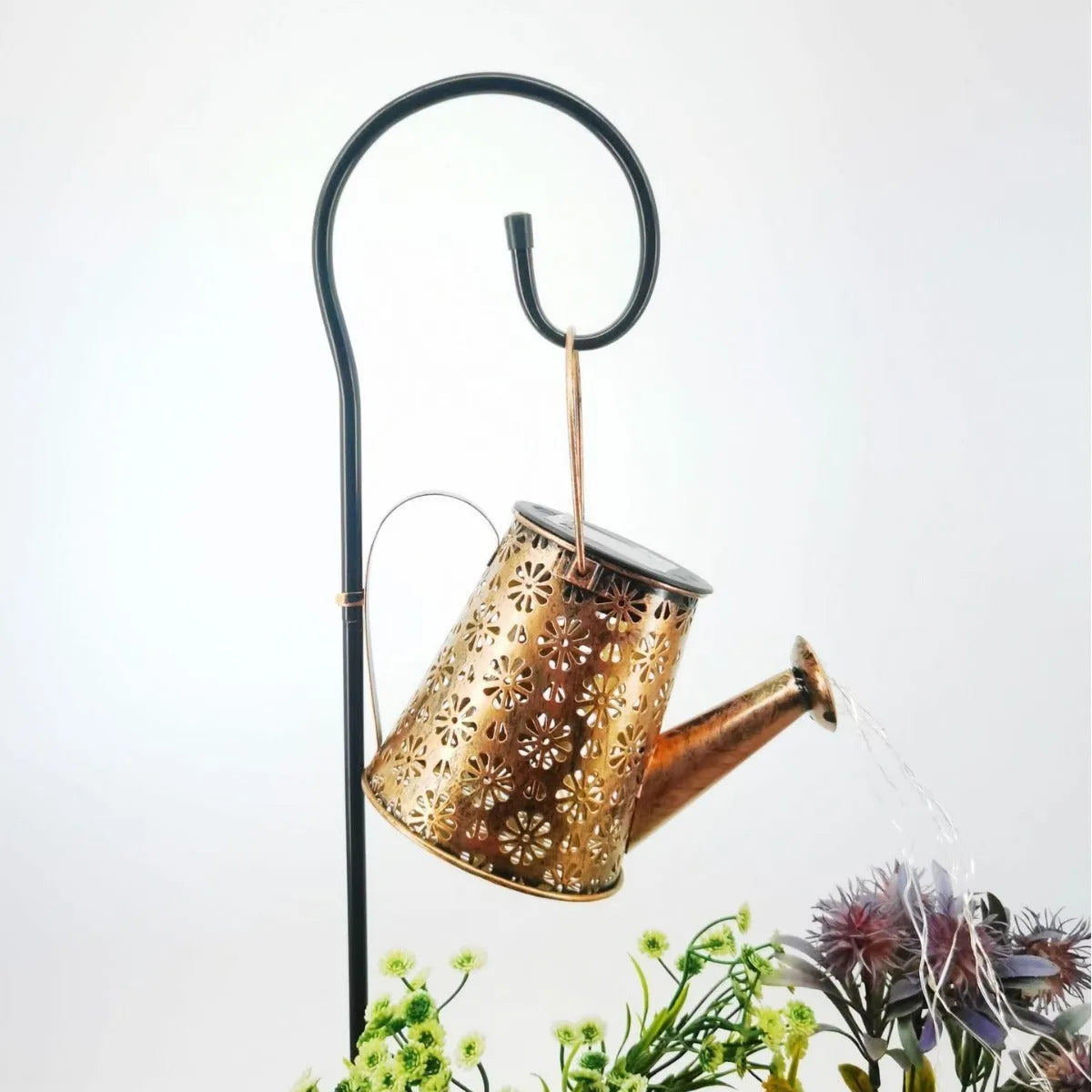 Solar butterfly kettle garden light with wrought iron construction and decorative design