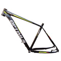 Black green aluminium 29-inch mountain bike frame showing disc brake mount and internal cable routing ports.