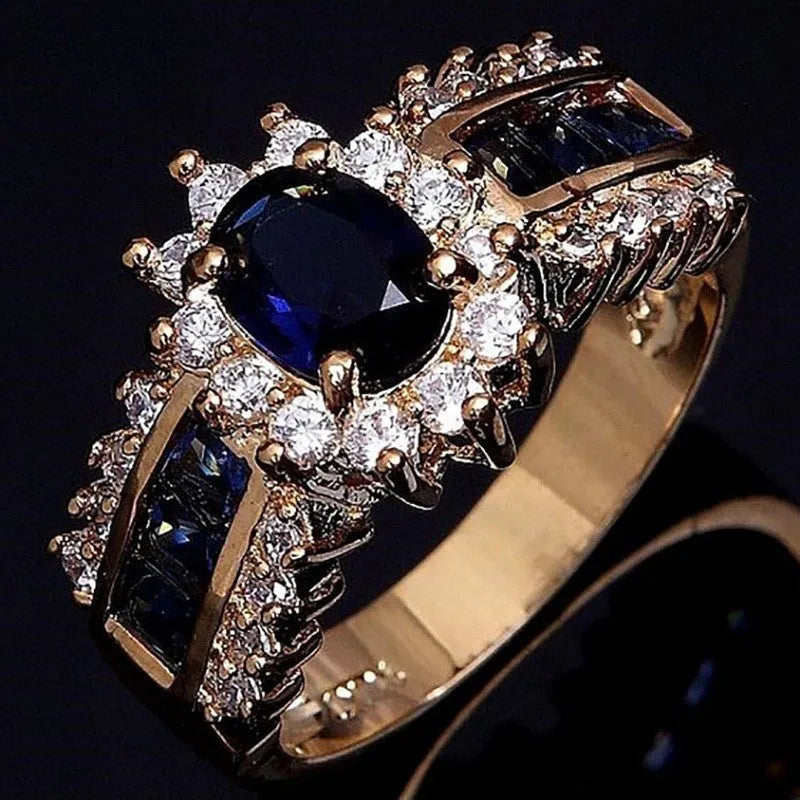 Personalised zinc alloy ring for men and women in a choice of three designs: sunflower blue diamond, square blue zircon, or square purple zircon.