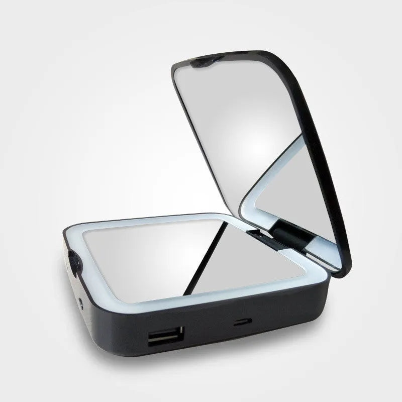 Black and white makeup mirror with 4x magnification and HD mirrors, featuring adjustable warm and cold lighting