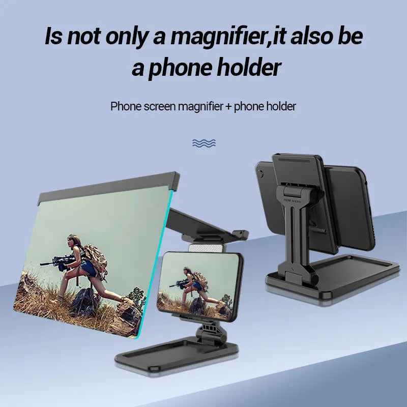 Black folding mobile phone screen amplifier with detachable holder, shown magnifying a smartphone display.