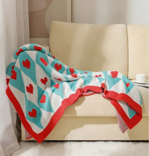 Acrylic sofa blanket with tassels in geometric pattern colour option