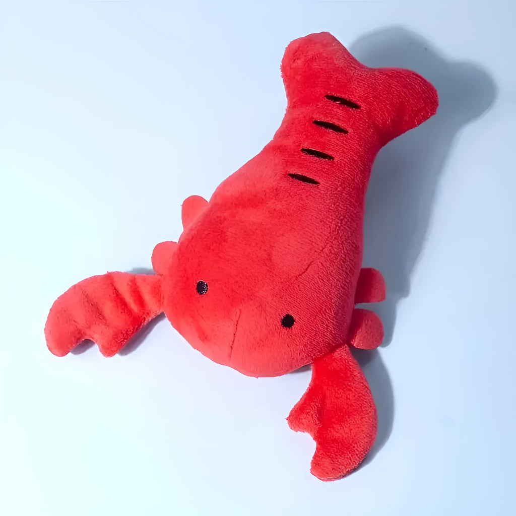 Red lobster stuffed squeaky dog toy for small and medium breeds on white background