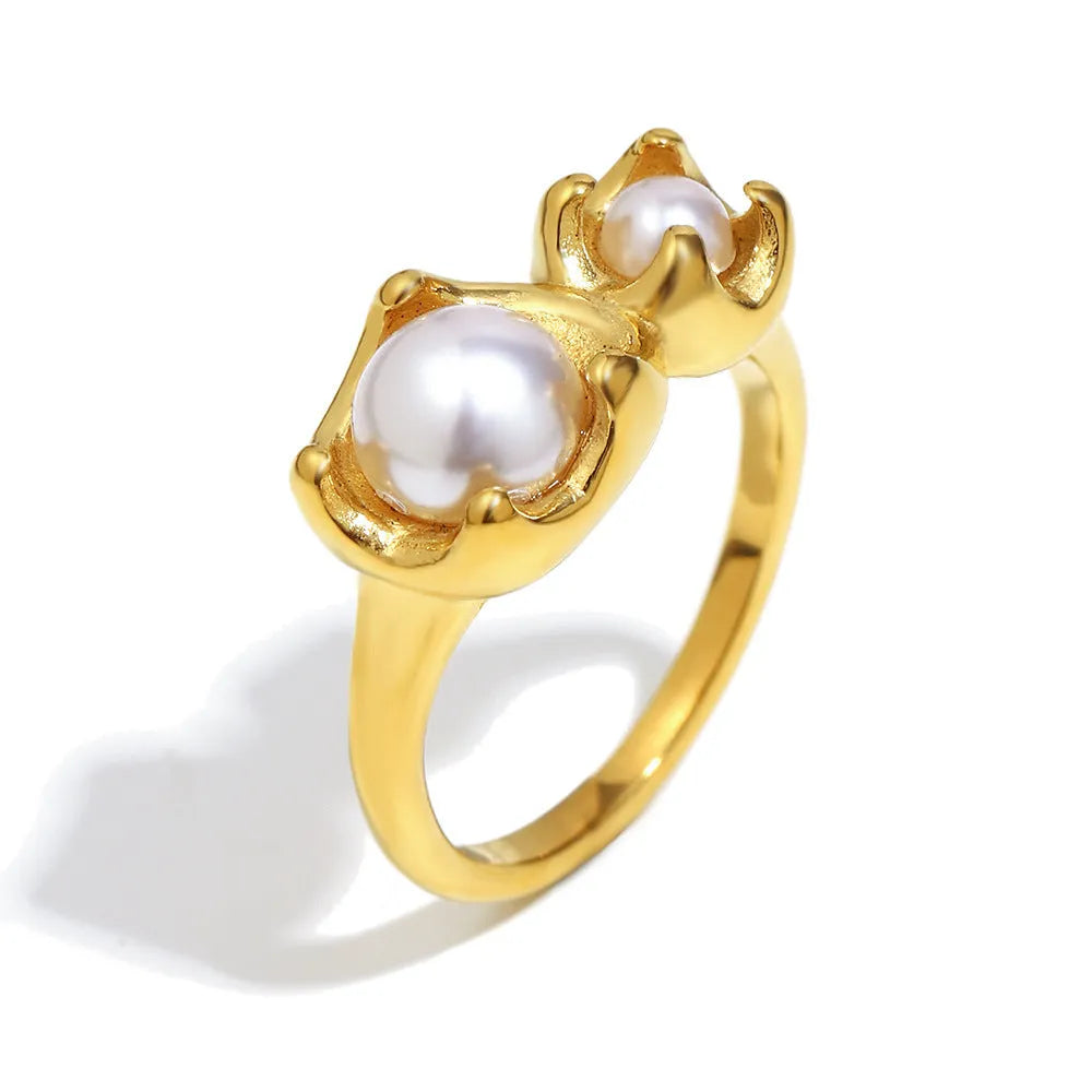 Gold stainless steel ring for women with bud imitation pearl and flower geometric design, sizes No 6 to No 8