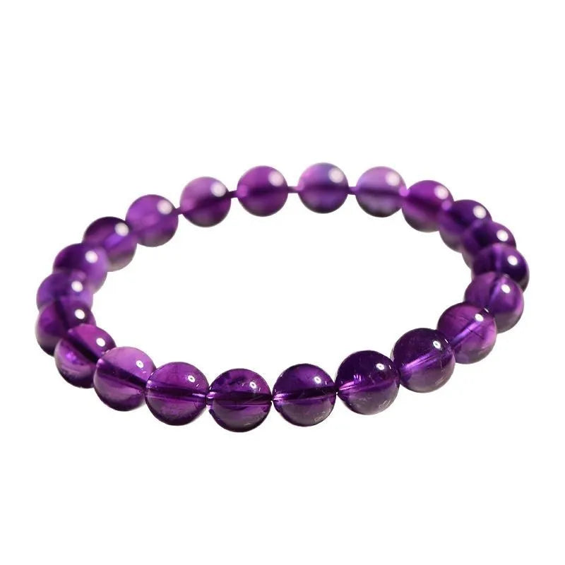 Natural amethyst scattered bead bracelet on wrist showing polished crystal and size options.