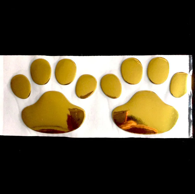 PVC car sticker with 3D hand-shaped brush texture forming dog footprints, in black, gold, red, or silver.