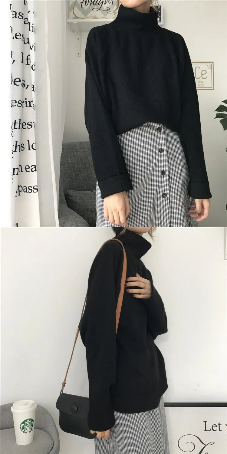 Women's solid colour long sleeve top with a half-high collar shown in a loose fit.