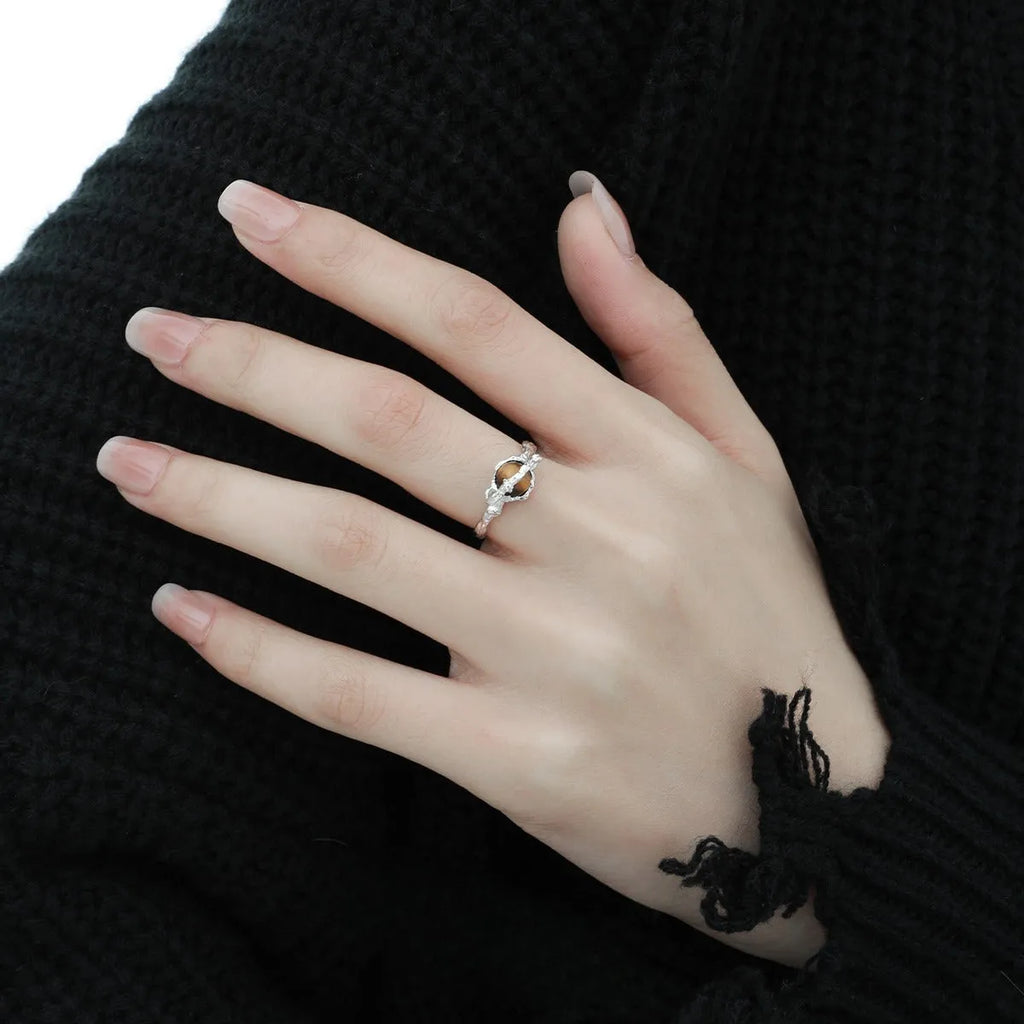 Women's adjustable Saturn open ring in white gold colour on silver.