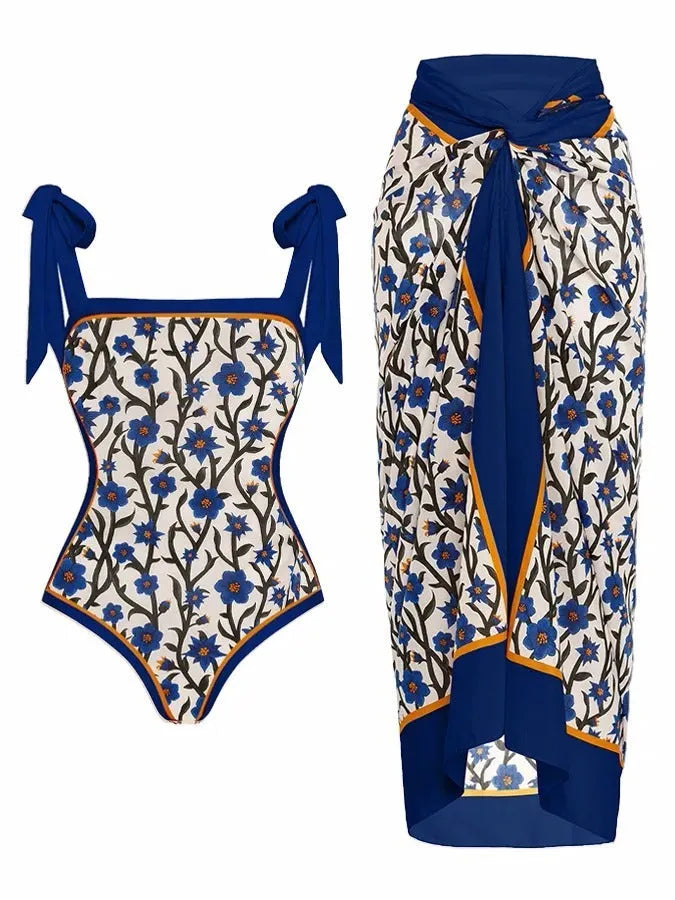 Women's printed floral chiffon two-piece swimsuit with a matching hip skirt.