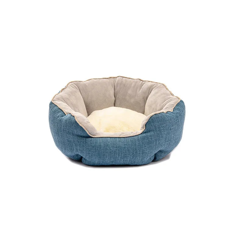Blue octagonal pet bed with high sides, soft interior, and a removable mat for a cat or small dog.