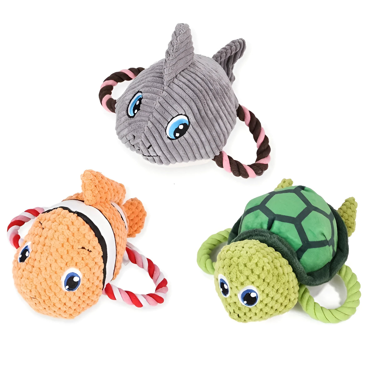 Grey, green, and orange turtle-shaped stuffed dog knot chewing toy on a plain background.