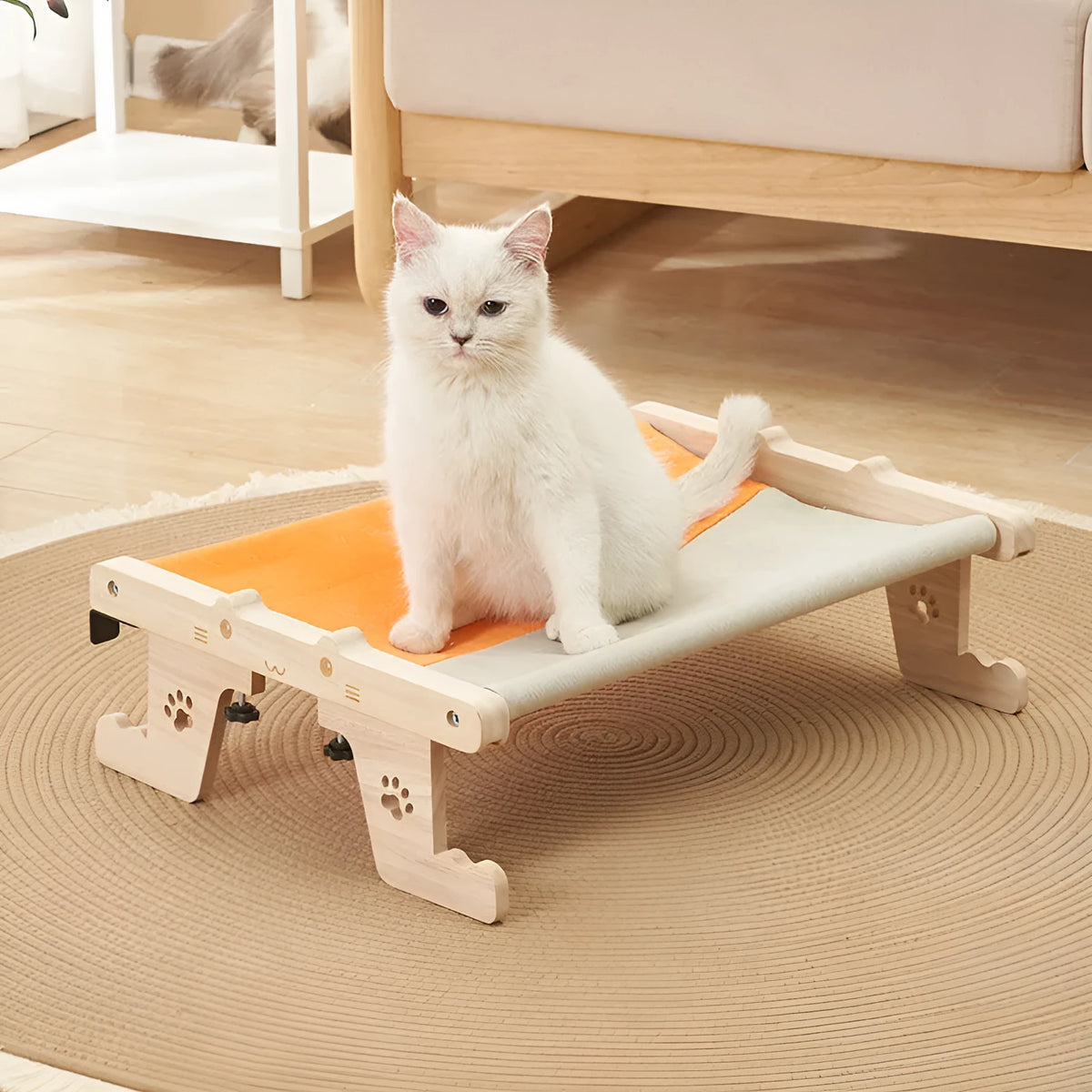 Wooden cat hanging bed hammock suspended by rope, shown installed on a balcony.