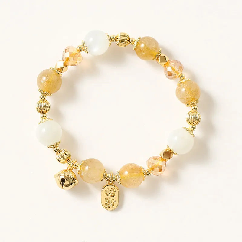 Gold coloured rutilated quartz crystal bracelet with electroplated finish in Korean style.