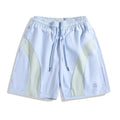 Men's black quick-drying sports shorts with elastic waistband and loose straight-leg design