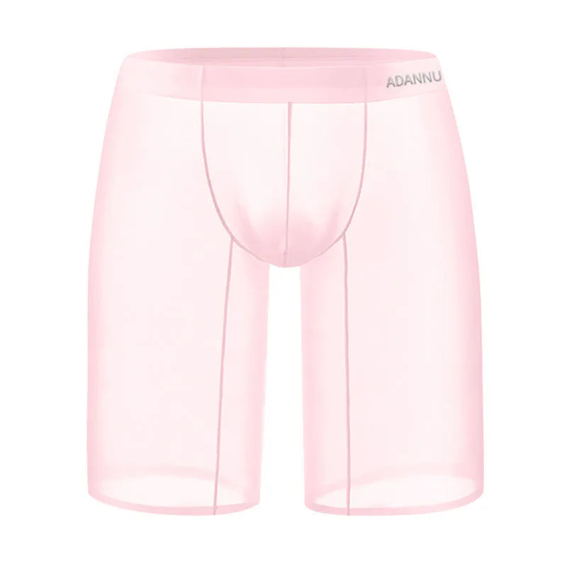 Men's seamless nylon mesh home shorts in black, shown in a casual setting.