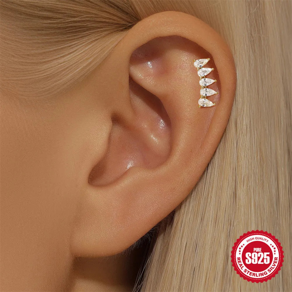 S925 sterling silver geometric moon earring with an embedded star detail in a gold colour finish.