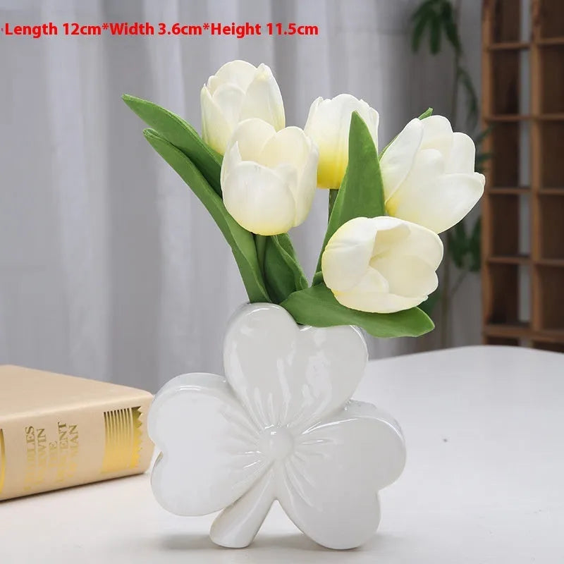 White porcelain clover-shaped ceramic vase in light green, pink, red, or white colours.