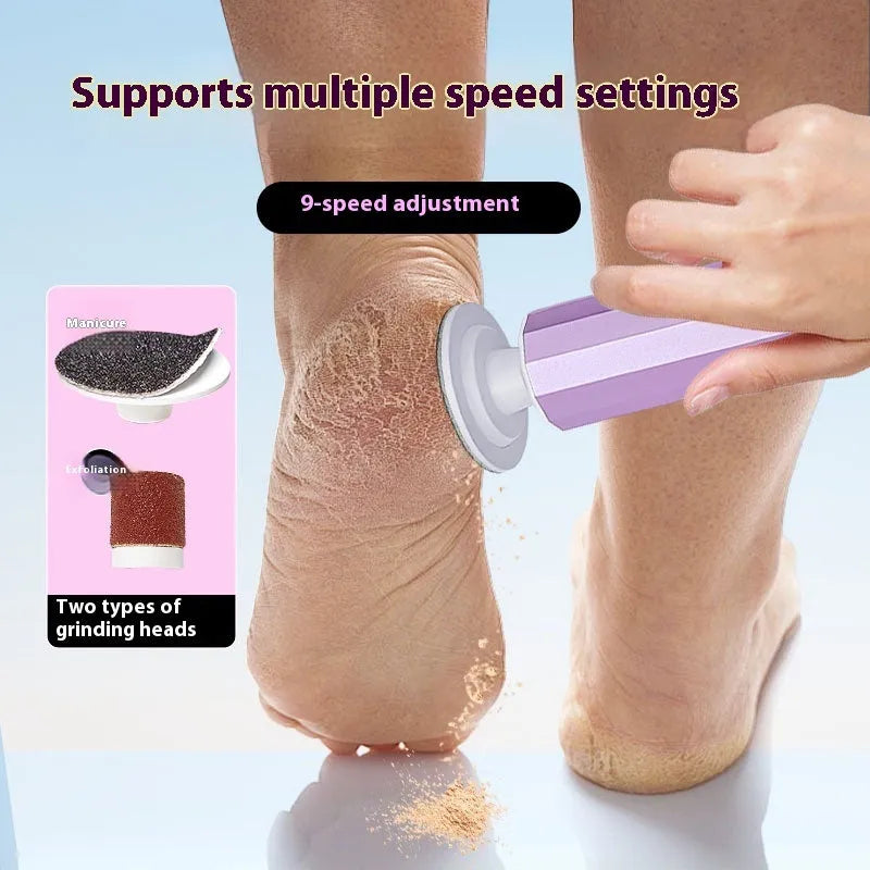 Pink USB-powered electric callus remover tool with sandpaper discs on a table.
