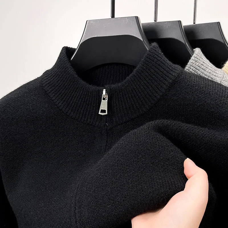 Men's black knitted zip cardigan with stand collar showing loose fit and thickened fabric texture