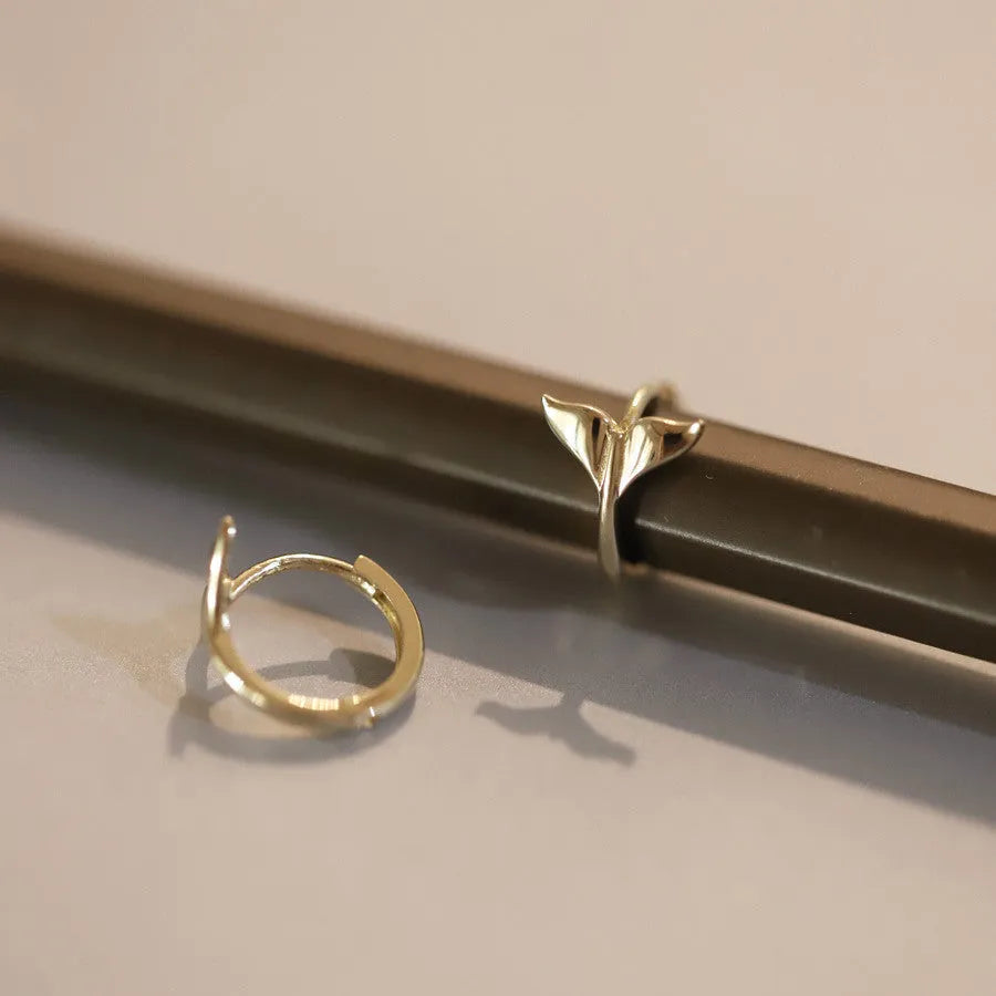 S925 sterling silver fishtail earrings with gold plating showing smooth polished surface