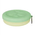Portable foldable dog food and water bowl with snack box in light pink and green two-tone colour.