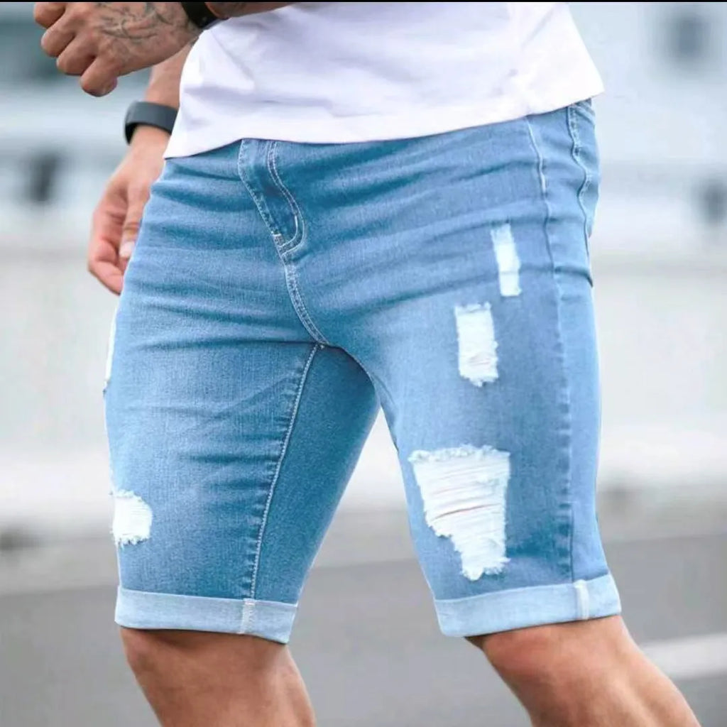 Men's sky blue denim shorts with multi-hole distressed design, low waist straight cut silhouette