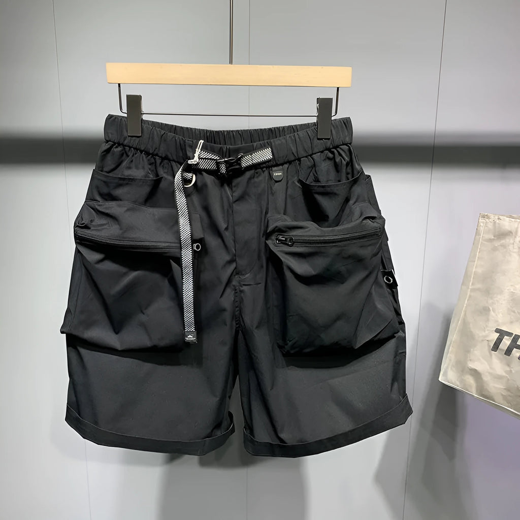 Men's large size work shorts with pockets in black or grey colours showing above knee length and loose fit design
