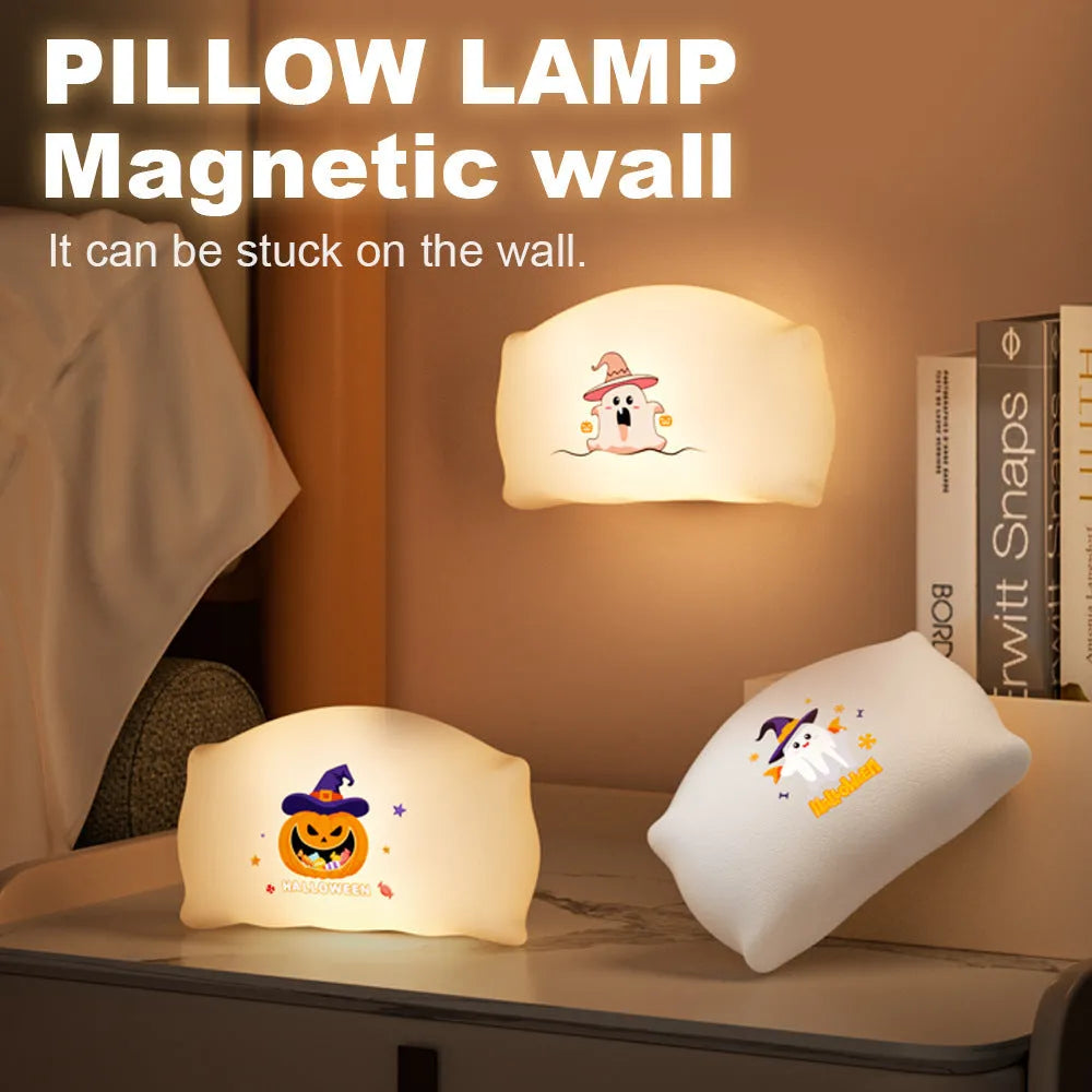 Cartoon Halloween ghost doll table lamp on a desk, showing warm light glow.