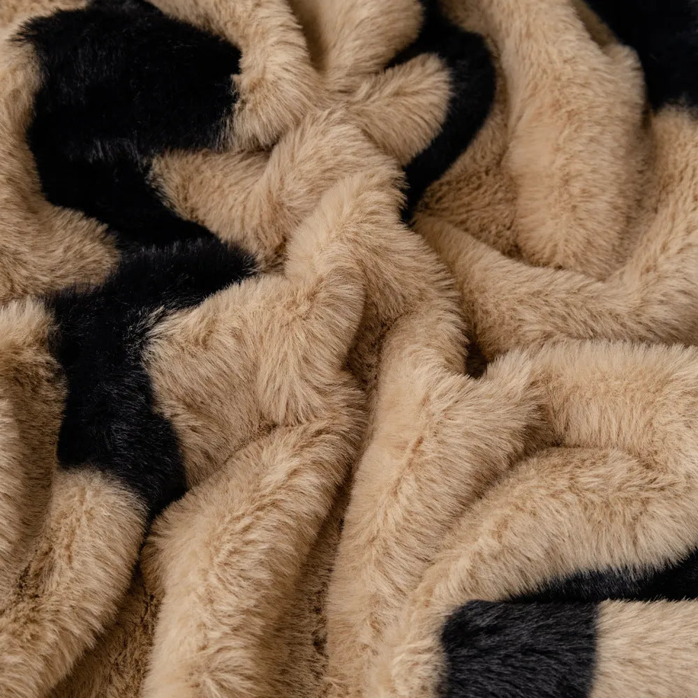 Zebra pattern thickened flannel sofa cover shown in caramel colour with matching pillowcase, demonstrating non-slip fit.