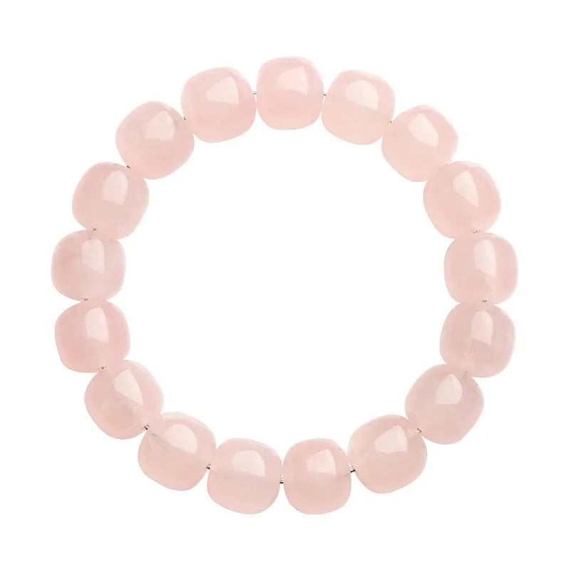 Pink natural crystal bamboo barrel bead bracelet with geometric 11-12mm beads.