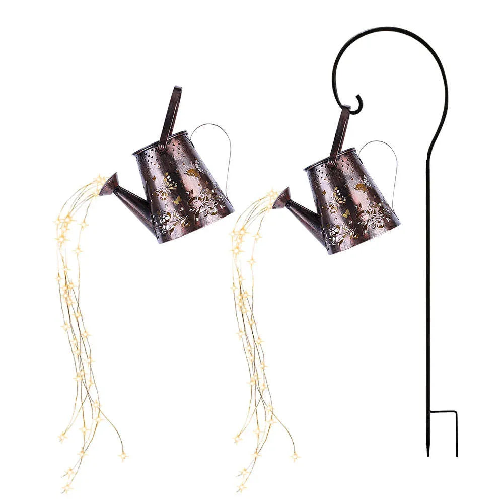 Solar-powered tapered butterfly pattern iron garden lamp emitting warm white light.