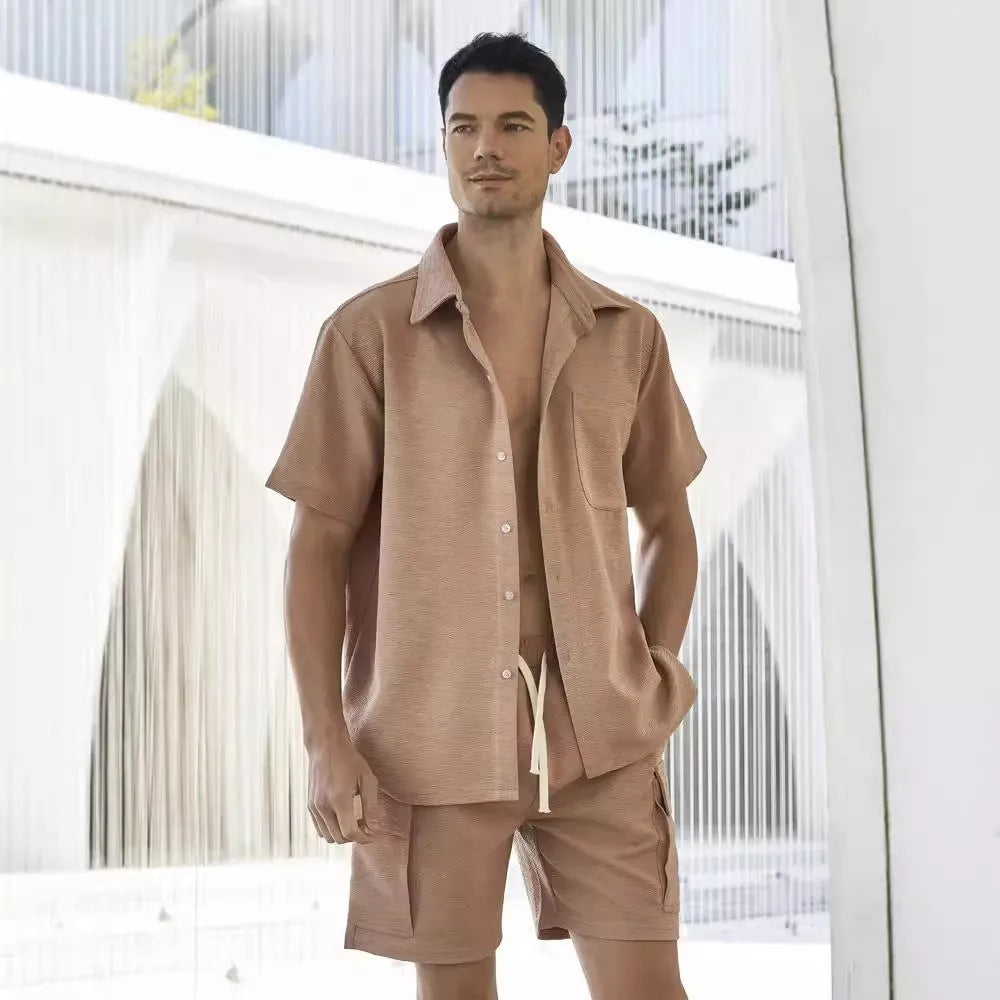 Women's elastic waist shorts and short sleeve top co-ord set in beige.