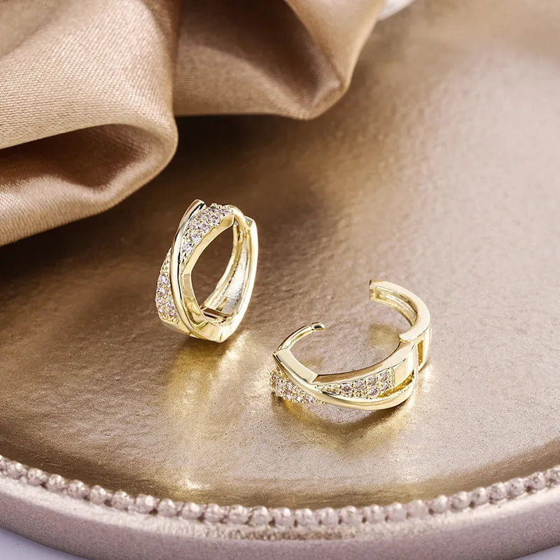Geometric wild earrings in copper with zircon details and 14K yellow finish