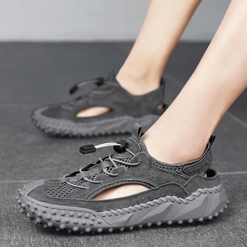 Men's black leather mesh sports sandals with elastic band and rubber sole.