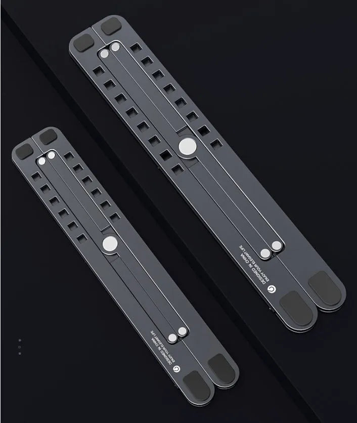 Silver aluminium laptop stand in folded and unfolded positions next to a 15-inch laptop.