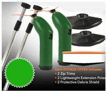 Cordless handheld lawn trimmer with extension pole and protective shield on a garden lawn.
