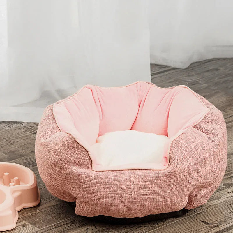 Blue octagonal pet bed with high sides, soft interior, and a removable mat for a cat or small dog.